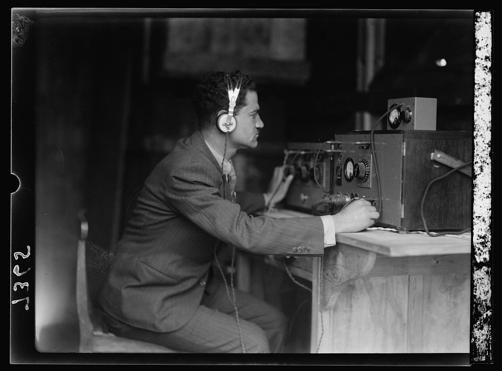 An engineer operating broadcasting equipment at the opening of Palestine Broadcasting Service in 1936
