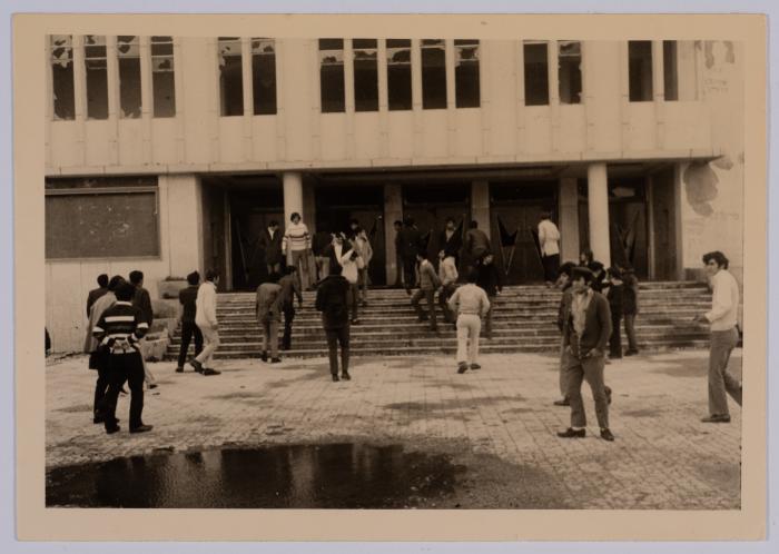 Black and white photo of pupils standing in front of the school in the village of Reineh